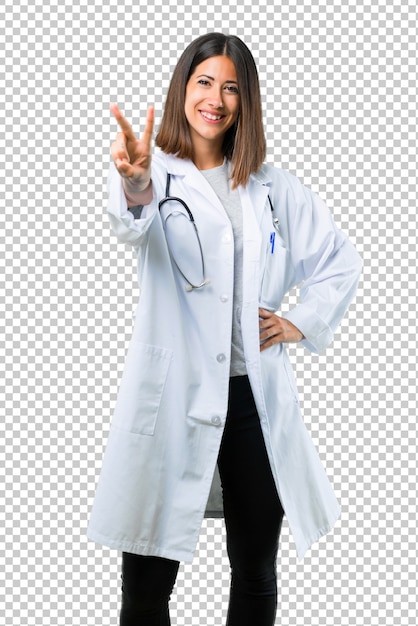 Doctor woman with stethoscope smiling and showing victory sign