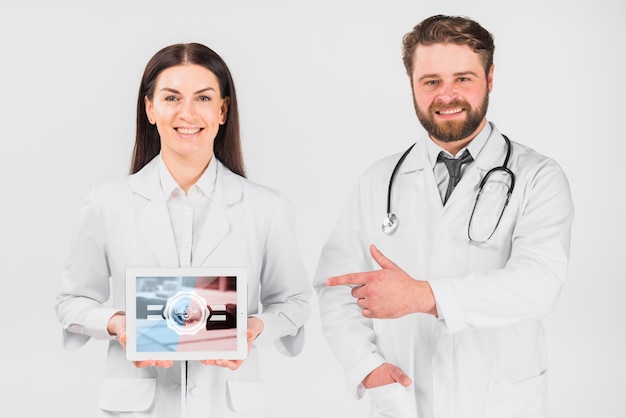 Doctors holding tablet mockup for labor day