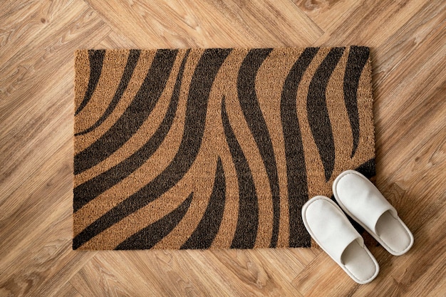 Doormat mockup with leopard print and white slippers