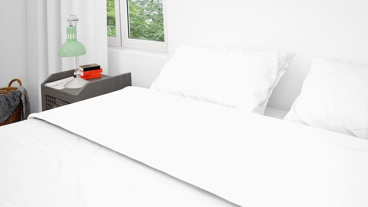 PSD double bed with white pillows and sheets, closeup
