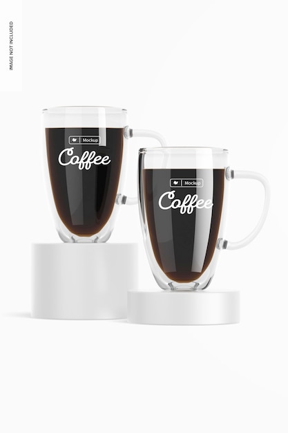 Double walled glass mugs mockup, on podiums