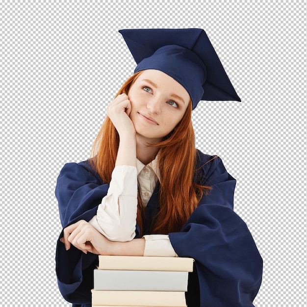 Dreamy graduate woman smiling thinking sitting with books