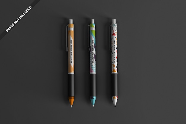 Drie kleurrijke pennen mockup