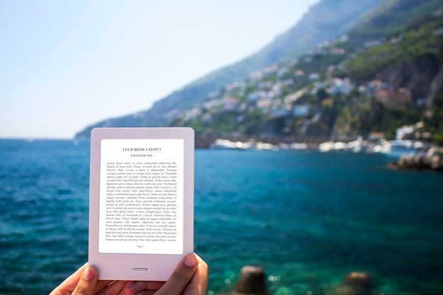 PSD e-book reader, mock-up, blue sea background