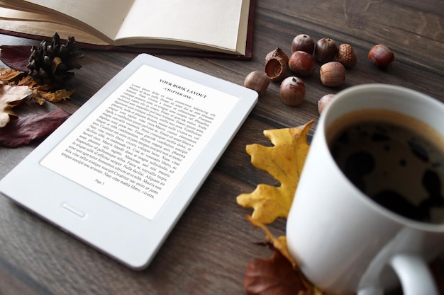 PSD e-book reader mock-up with autumn leaves, chestnuts, coffee and vintage notebook