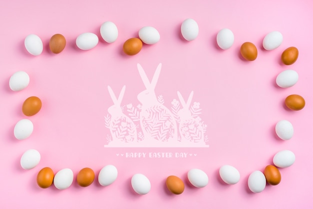 Mockup di giorno di pasqua con uova e coniglietti