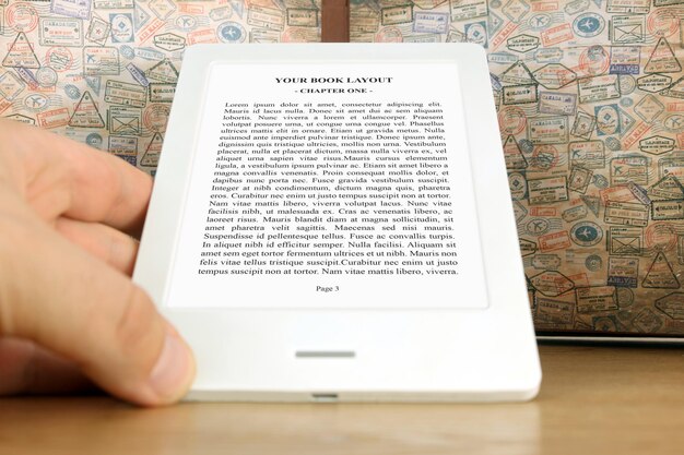 Ebook reader mockup and holding hand on travel stamps background