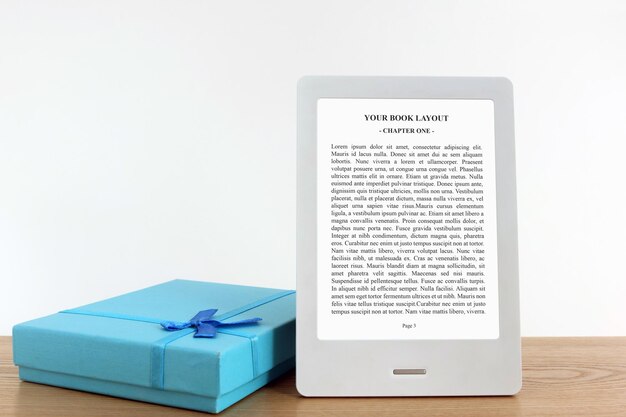 PSD ebook reader mockup with gift box in blue