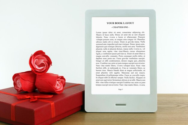 Ebook reader mockup with gift box in red and red roses