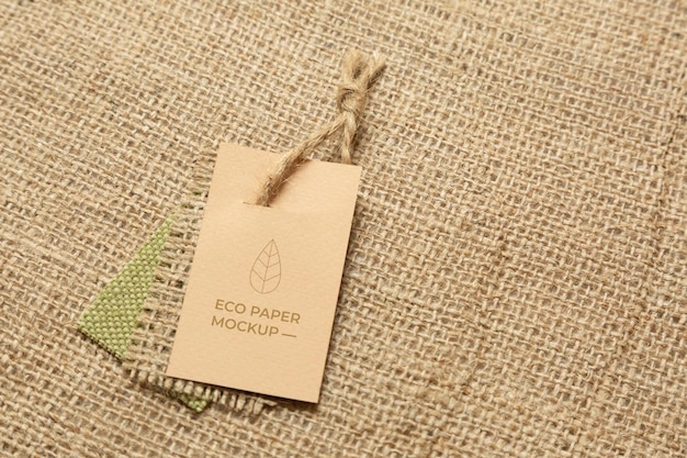 Eco paper label mock-up on burlap textile