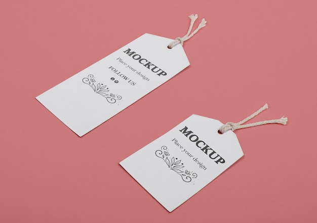 PSD eco tags on pink background high angle