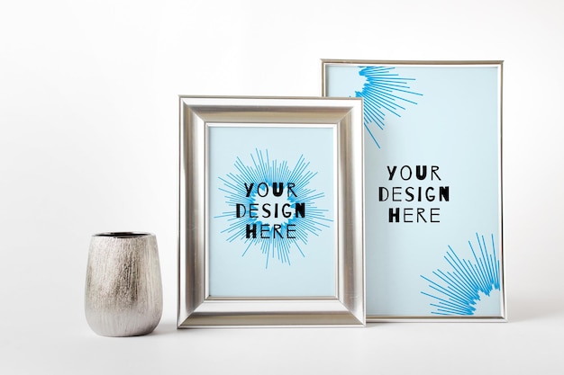 PSD editable psd mockup with composition of two silver metallic frames and silver glass pot