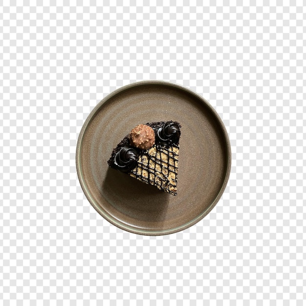 een bord met een stuk eten en een stukje chocolade erop