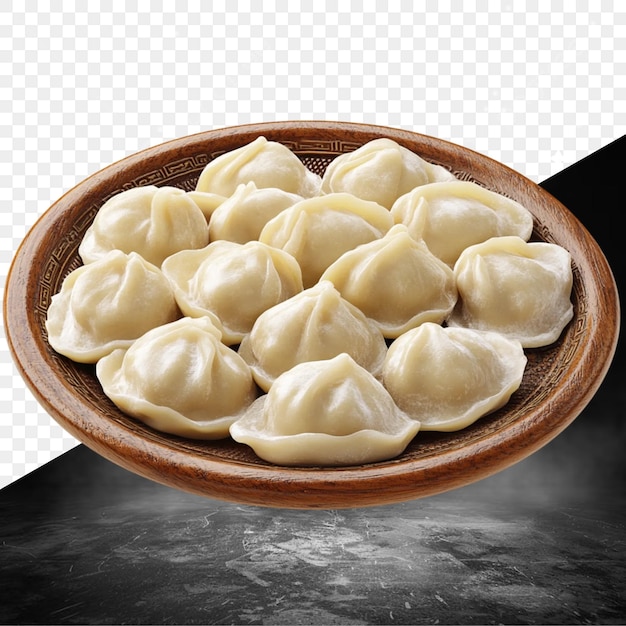 een bordje dumplings met een zwarte achtergrond