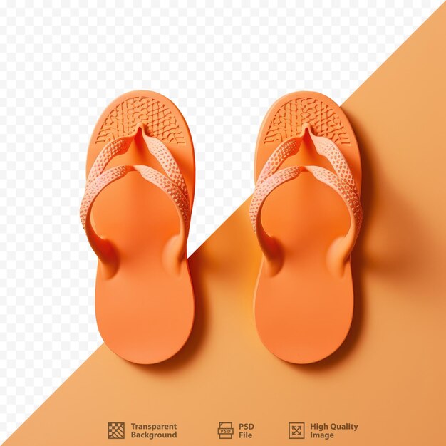 Een paar oranje slippers met een oranje achtergrond.