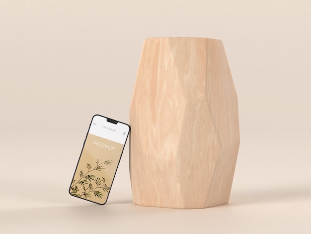 Elegant arrangement met mock-up smartphone en vaas