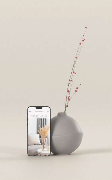 Elegant arrangement met mock-up smartphone en vaas