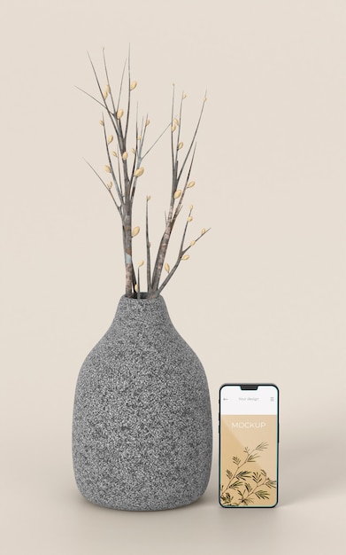 PSD elegant assortment with mock-up smartphone and vase