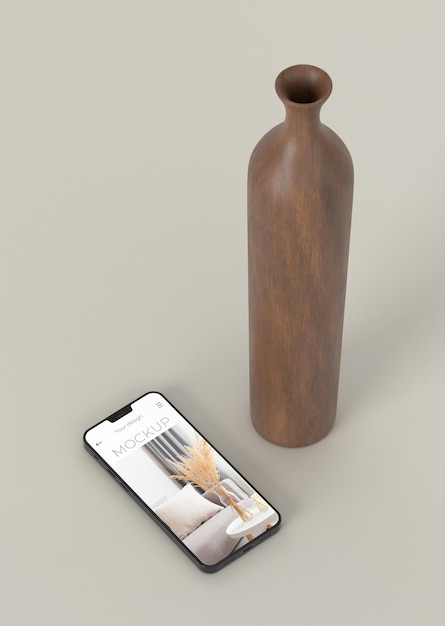 elegant assortment with mock-up smartphone and vase