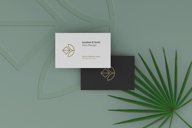 Elegant dark and white business card mockup with plants as background