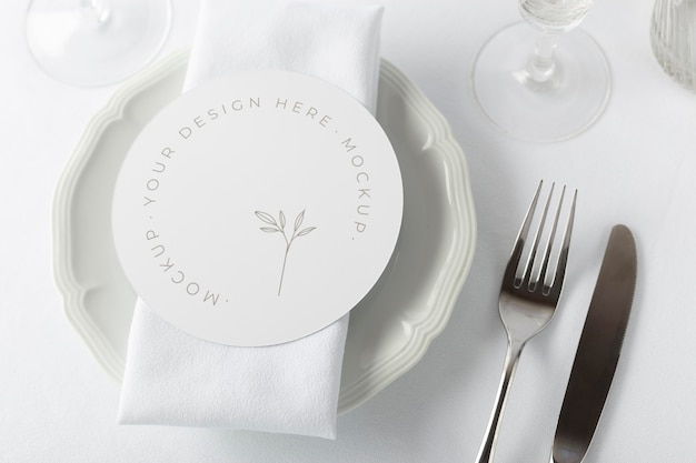 Elegant tableware composition with round mock-up card