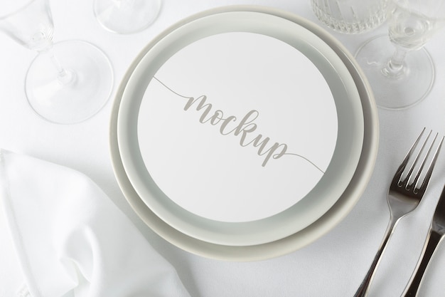 Elegant tableware composition with round mock-up card