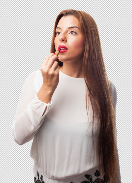 PSD elegant woman using a lipstick