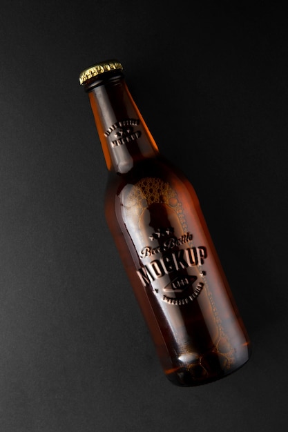 PSD embossed effect on old bottle mockup