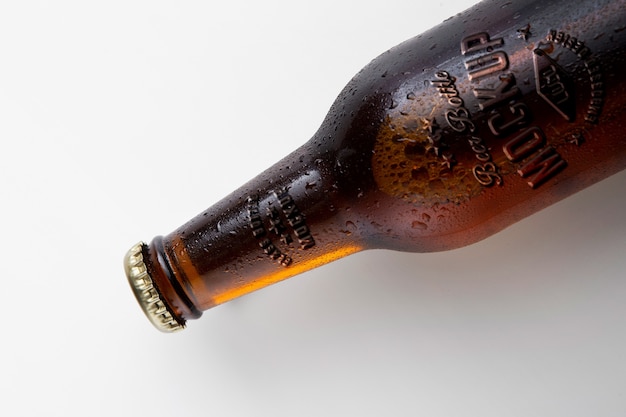 PSD embossed effect on old bottle mockup
