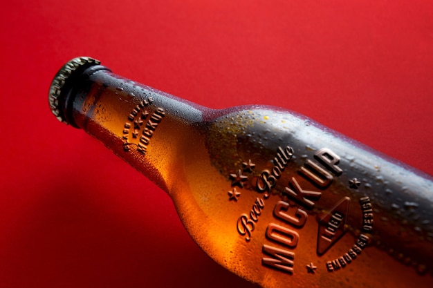 PSD embossed effect on old bottle mockup