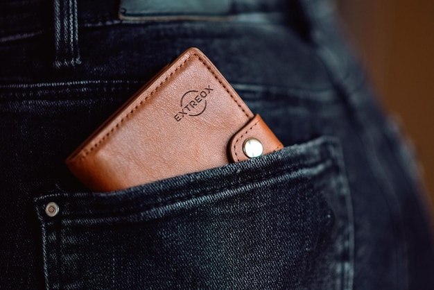 embossed and engraved logo mockup on leather wallet for premium branding