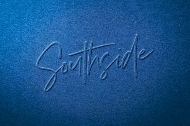 Embossed logo mockup on blue textured background