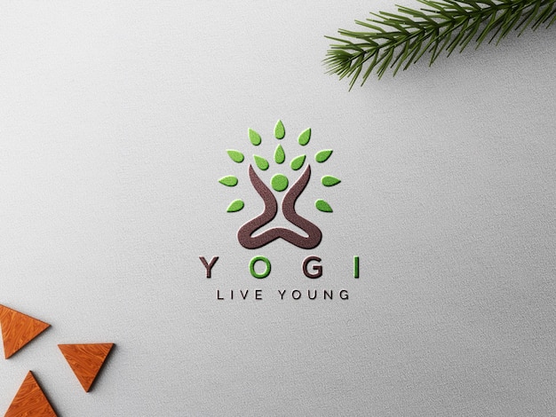 PSD mockup con logo in carta goffrata con foglie e forme decorative in legno