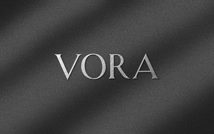 PSD embossed silver logo mockup on black wall