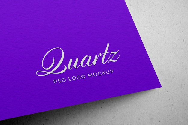 PSD embossed white logo mockup on purple kraft paper