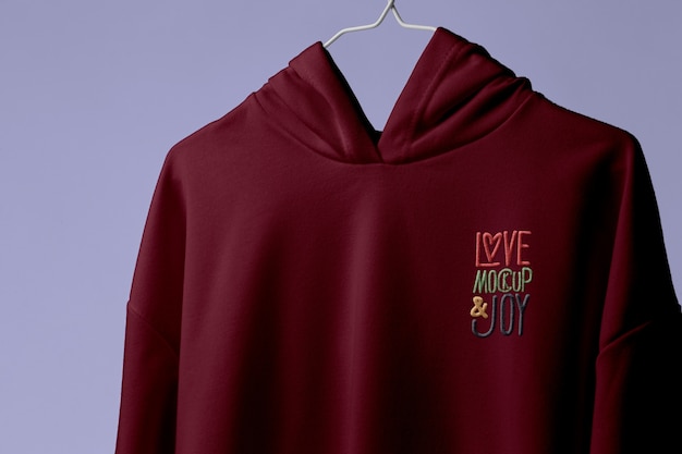 Embroidered logo on burgundy hoodie