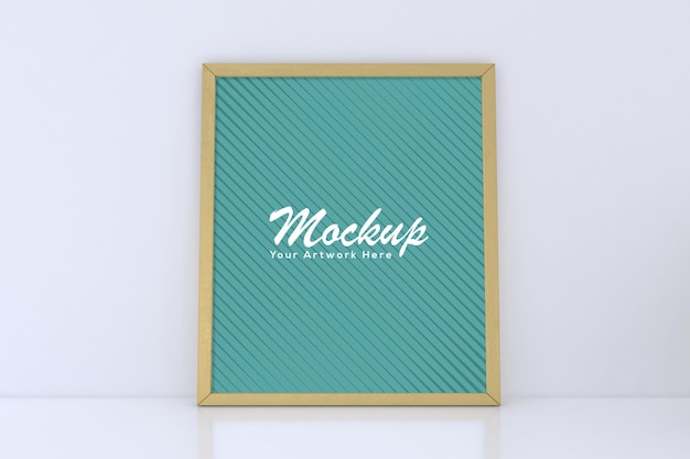 Empty golden photo frame mockup on white background