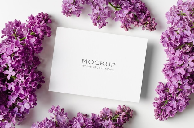 PSD empty invitation or greeting card mockup with lilac flowers