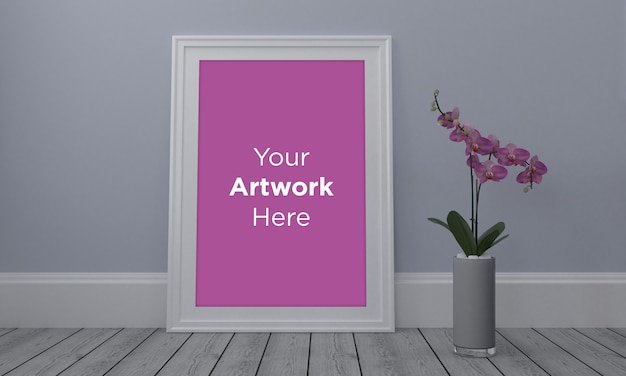 PSD empty photo frame with flower in vase mockup design