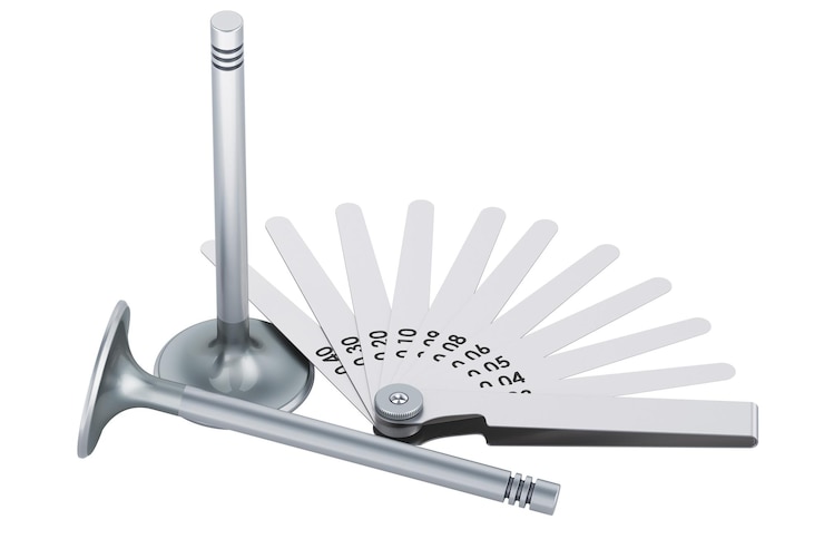 PSD engine intake valves with feeler gauge metric offset valve thickness gauge 3d rendering isolated on transparent background
