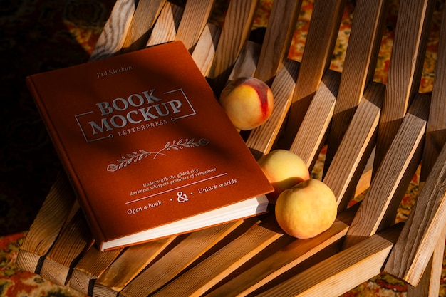 Engraved book with peaches mockup