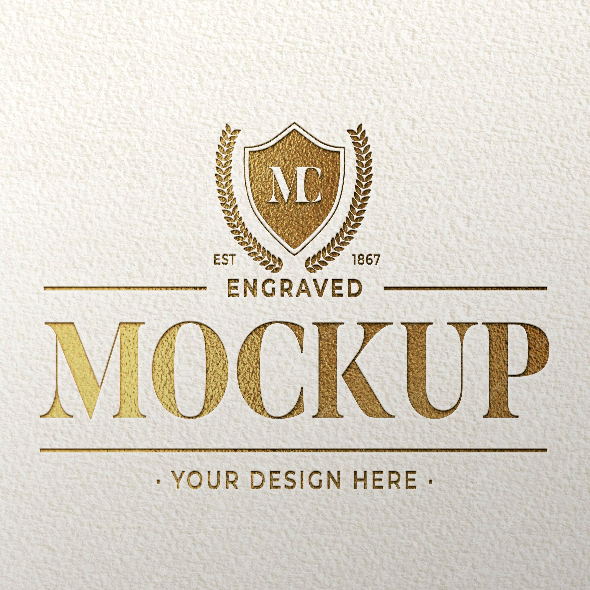 Premium PSD | Engraved golden logo mockup