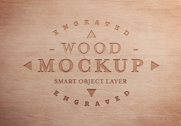 PSD mockup effetto testo in legno inciso