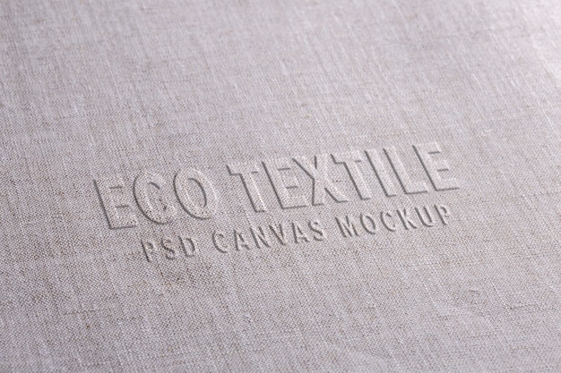 Fabric logo mockup on white linen cloth. Natural surface with displaced text style