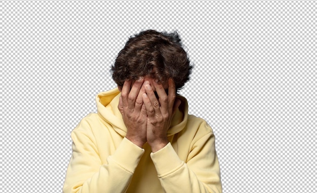 feeling sad frustrated nervous and depressed covering face with both hands crying