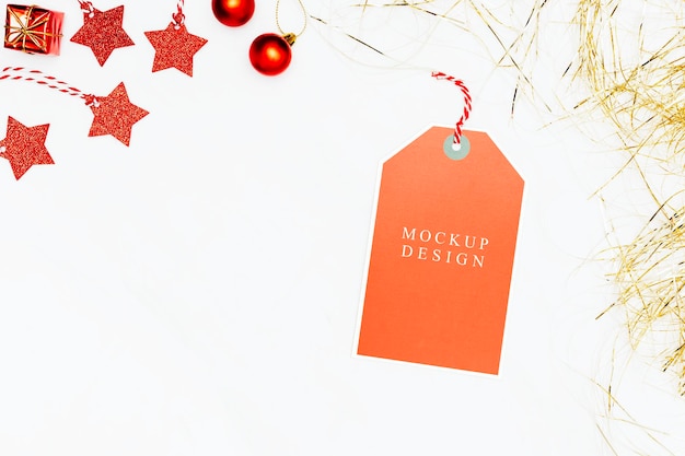 PSD festive orange tag on white marble background mockup