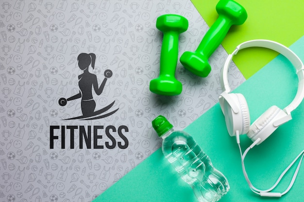 헤드폰 및 물병이있는 Fitnes 웨이트