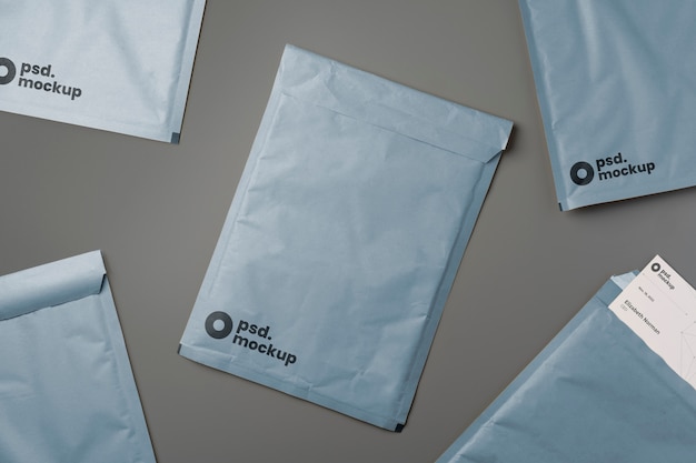 PSD flat lay over a4 envelope mockup