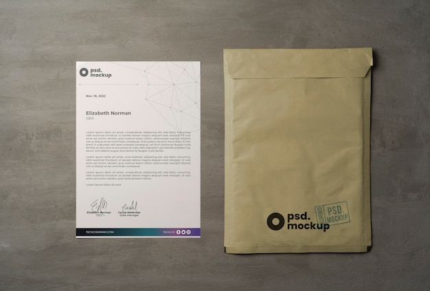 PSD flat lay over a4 envelope mockup