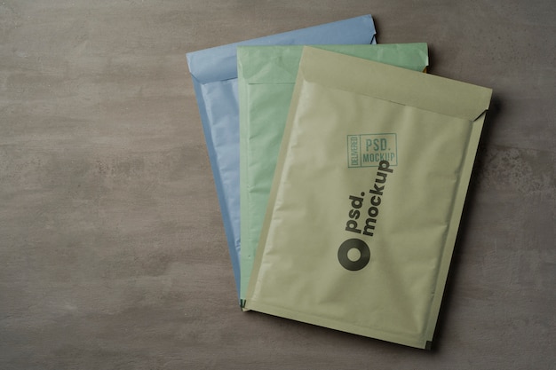 PSD flat lay over a4 envelope mockup